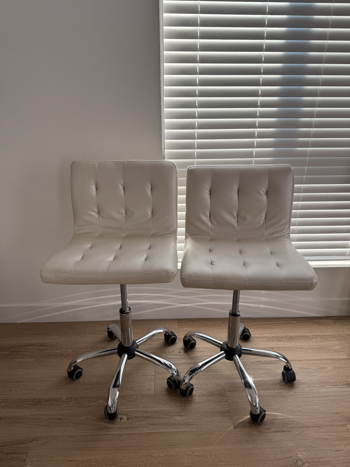 Pair of White Faux Leather Chairs