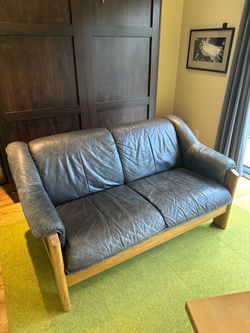 Danish teak and leather small sofa