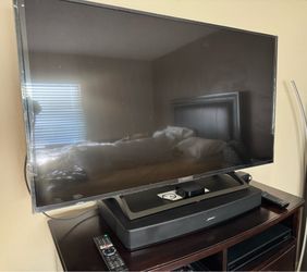 SONY KD-49X720E 49 inch 4K HDR SMART TV, BOSE SOLO 15/10 TV SOUND SYSTEM AND APPLE TV 4K HDR 64 GB