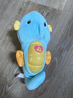 Fisher-Price Musical Baby Toy, Soothe & Glow Seahorse, Plush Sound Machine with Lights & Volume Control for Newborns, Blue