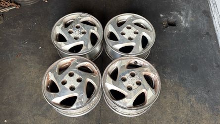 Toyota Corolla 14 Inch aluminum rims and caps 4x100mm Honda, Mazda