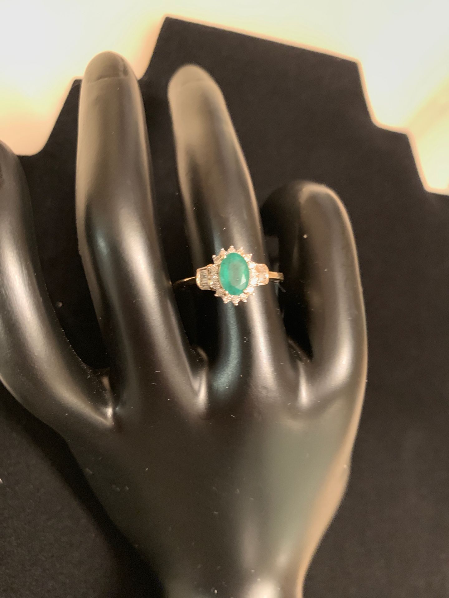 Ring, Emerald and Diamonds in 10K Gold.