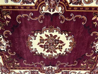 Dark red rug / new