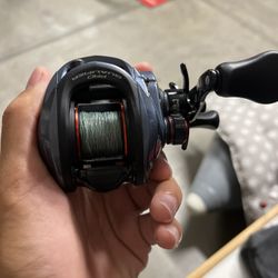 Barley Used Pro Qualifier Reel With 15 Pound Braid