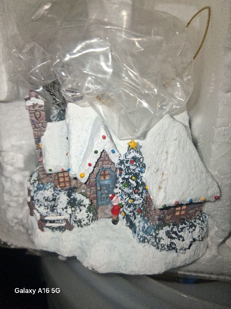 Beautiful Holiday ornaments by thomas Kinkade