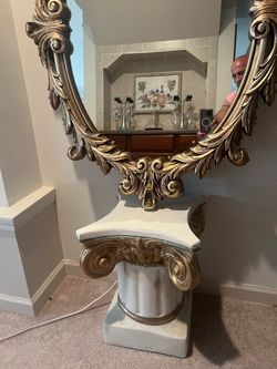 Beautiful mirror and pedestal