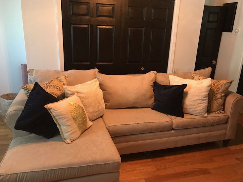 Sectional couch with decorative pillows