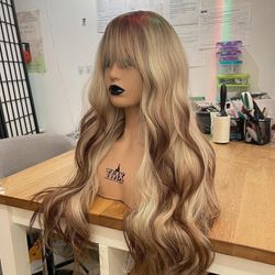 Human hair blend platinum blonde with brown highlights wig.