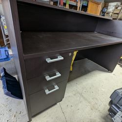 Receptionist desk and waiting room chairs