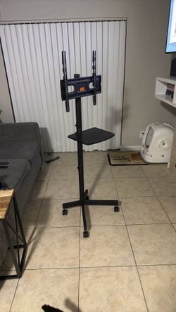 Heavy-Duty Rolling TV Stand for TVs Up to 75” – Adjustable Height with Shelf
