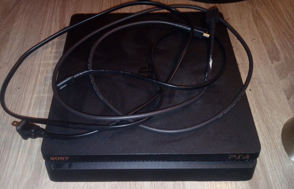 Console Sony PlayStation 4 Slim 500 Go Noire D'occasion – Parfait état