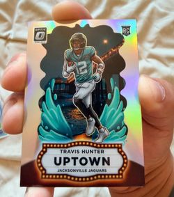 Travis Hunter Up-Town card and Josh Allen Stained Glass Jumbo card