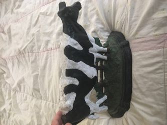 Cast iron cow door stop