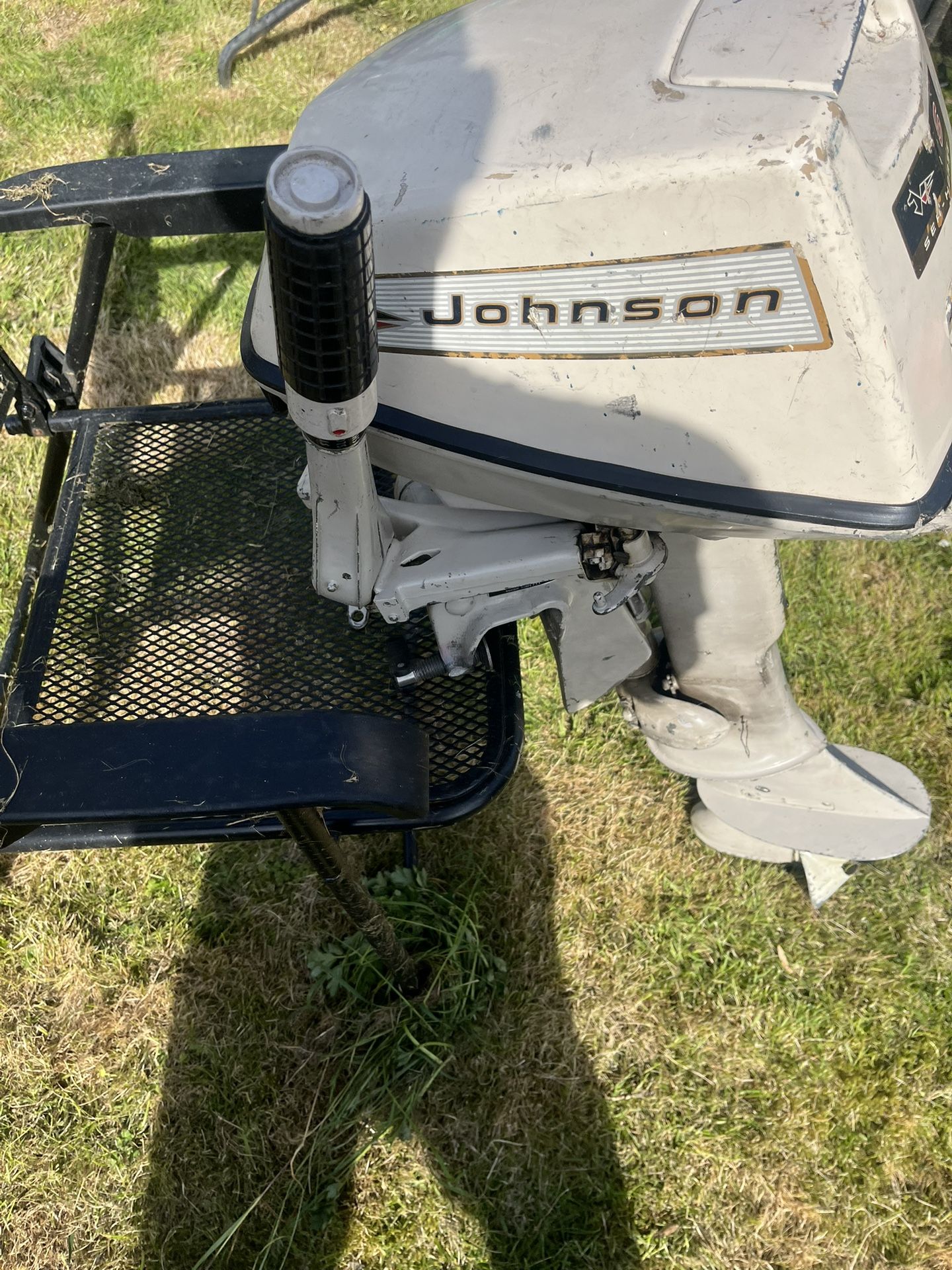 65 six horse Johnson two-stroke outboard