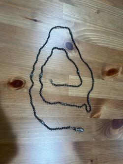 Long Black Beaded Necklace with Silver Accents