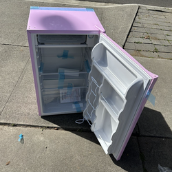 Brand new Pink mini refrigerator and freezer for $120