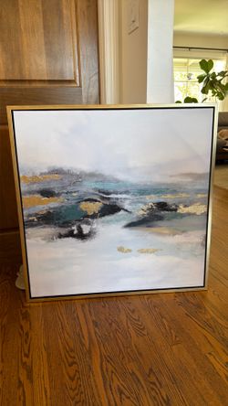 Large abstract art painting with gold accents