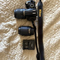 Nikon D3000, 18-55mm Lens, 55-200mm Lens, Strap, Battery, And Charger