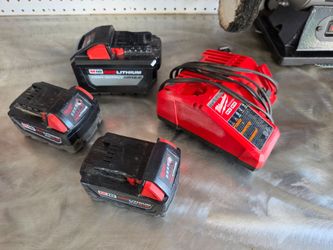 Milwaukee batteries and charger.