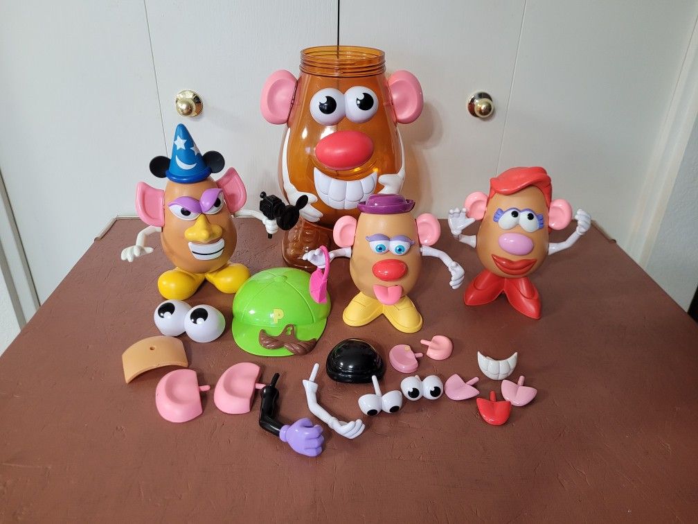 Mr. & Mrs. Potato Head & Friend With Large Potato Head Bucket -- 55 Pieces