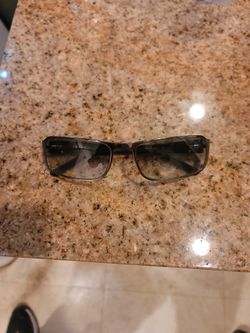 Authentic Prada Sun Glasses Normal Wear 1 Small Scratch On Each Lense But Not In Eye View.