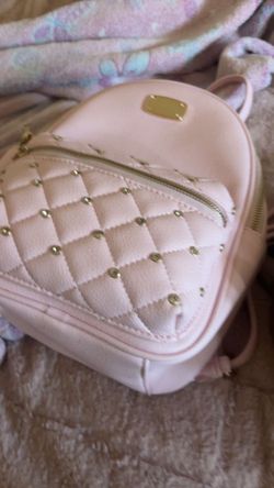 a pink mini Backpack 