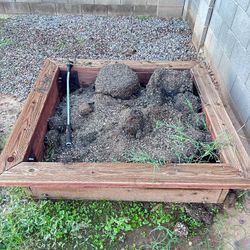 Raised Flower Beds And Potting Soil And Flower Pots