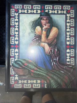 Native American woman pictured with framed