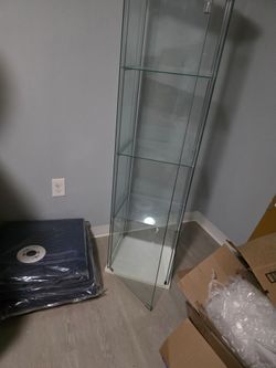 Transparent shelf cabinet.