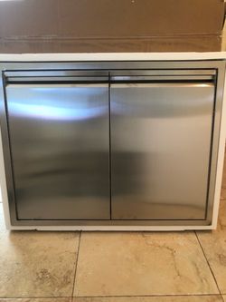 Outdoor kitchen doors drawers Blaze appliances grills griddles side burners refrigerators ice makers ovens