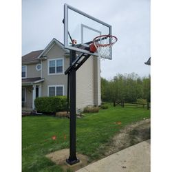 Goalrilla 54 inch in ground basketball hoop, adjustable basketball court
