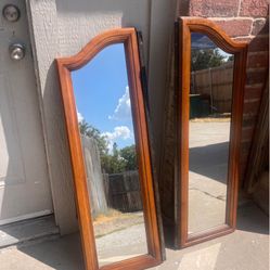 2 wood mirror panels Dimensions: 15”W x 43”H each