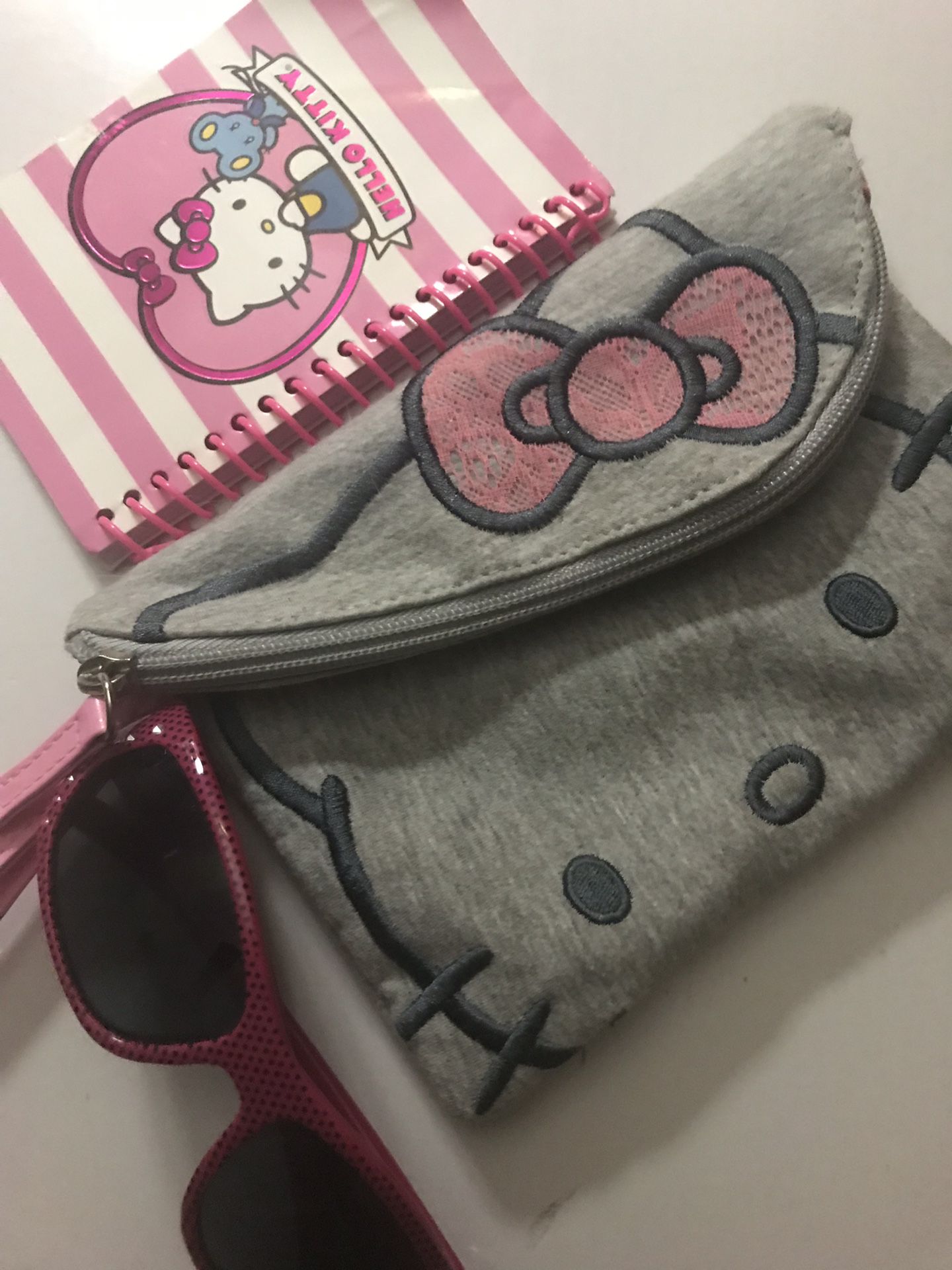 Hello kitty hand purse, sunglasses