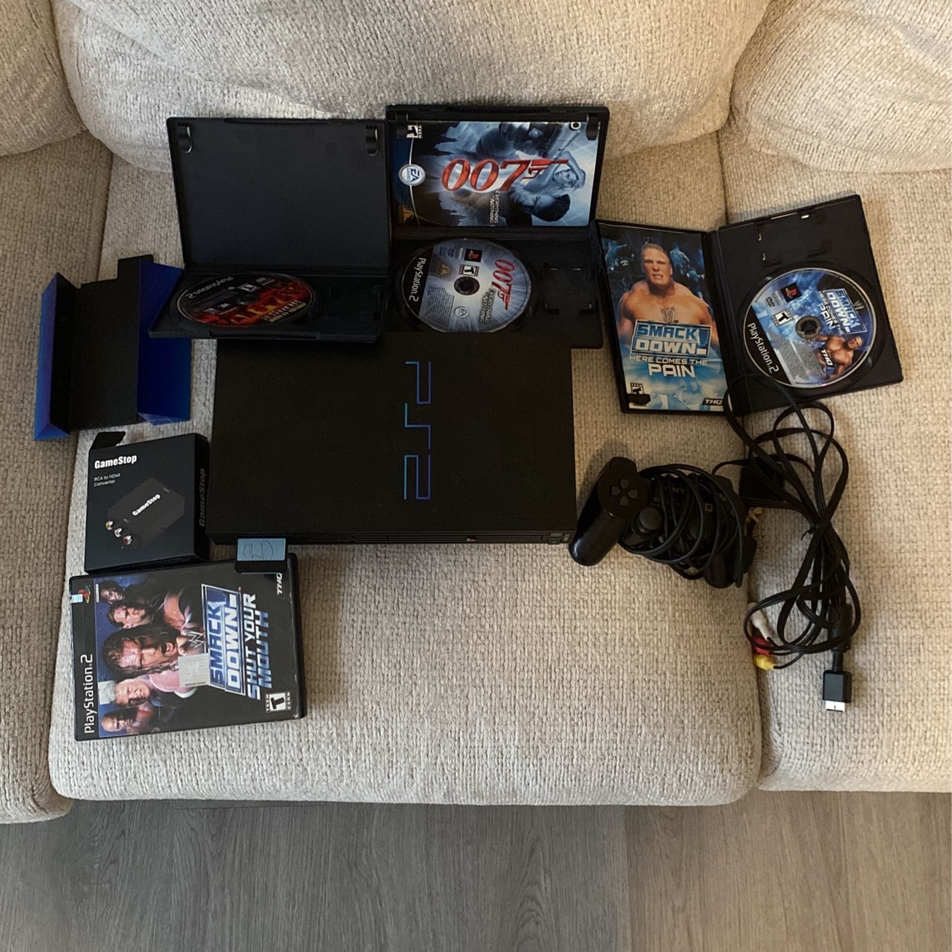 PS2 + 4 GAMES + RCA TO HDMI CONVERTER & MORE