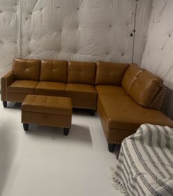 Carmel brown leather sectional couch and storage ottoman