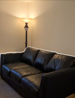 Three seater leather sofa - new like