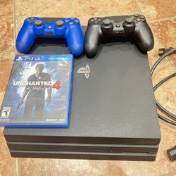 PS4 Pro with 2 Controllers & Uncharted 4