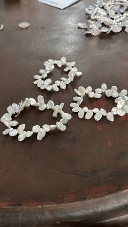 3  bracelets strand of freshwater pearls with a 14k clasp