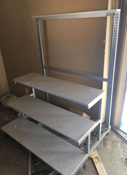 Tiered display table in wheels 5ft tall by 4ft