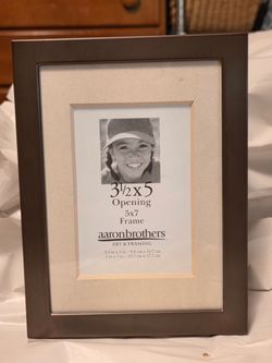 Aaron Brothers 3.5 x 5" frame, Bronze metal.   0604407