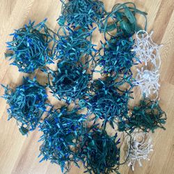 13 sets of pre-owned solid blue & white holiday /event lights w/ ext cord for $13.00