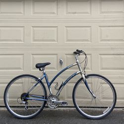 Electra Verse 24D Step-Through Hybrid Bike – 700C Wheels, 24-Speed Women’s Bicycle