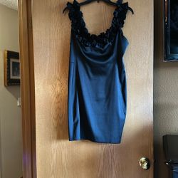 Woman’s Black Dress