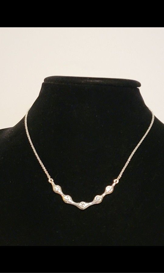 Rhinestoned Rhodium Avon NRT Necklace 5 Crystals Designer Tag Costume Jewelry 16" Long Add a touch of elegance to your outfit with this stunning