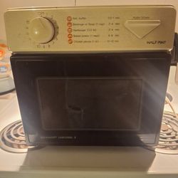 Sharp Carousel II Half Pint Compact Microwave, model R-1M53