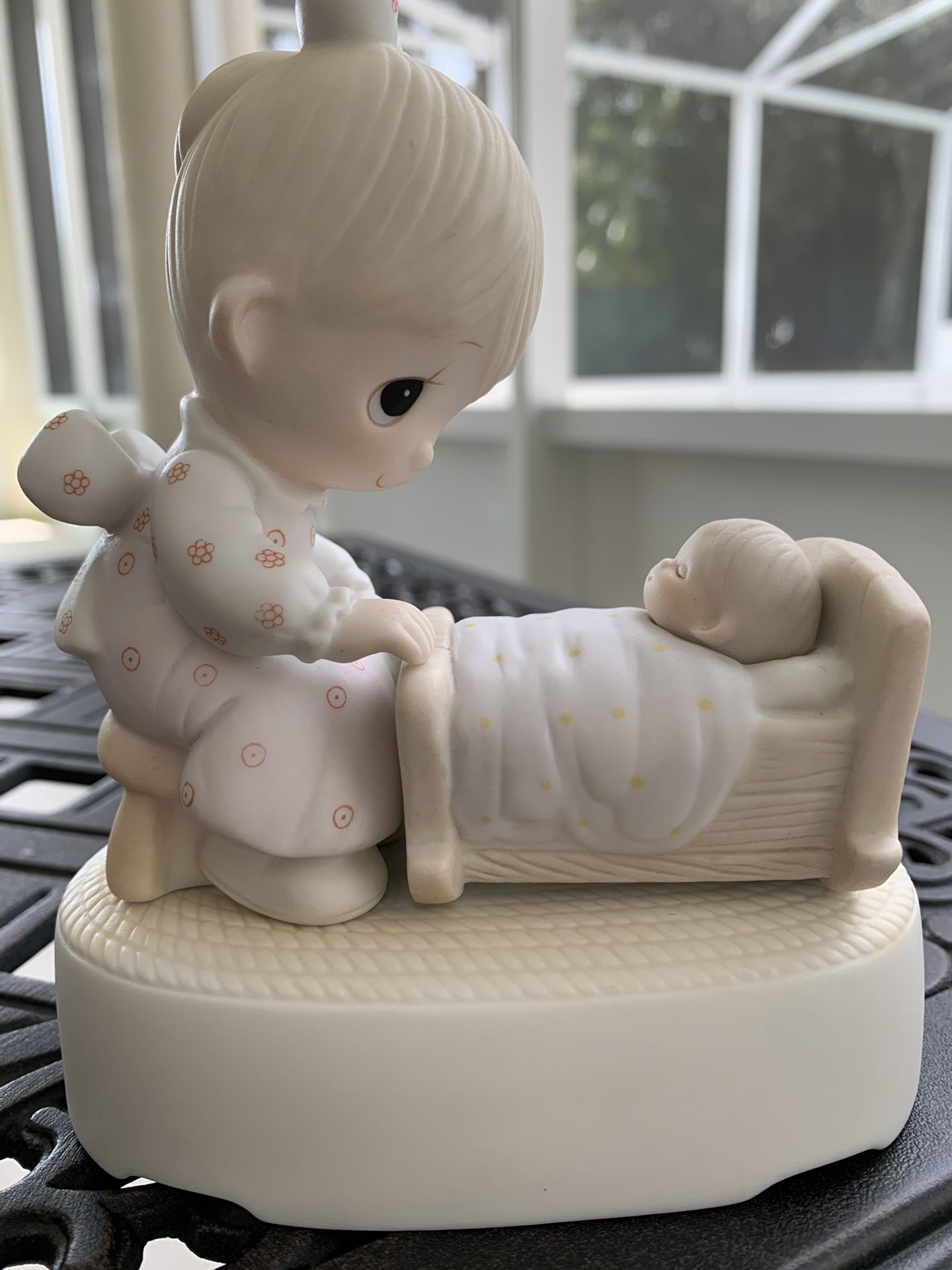 1980 PRECIOUS MOMENTS FIGURINE Enesco Musical Ornament "The Hand that Rocks the Future" Porcelain Figurine Item E-5204 In excellent condition   1980 P