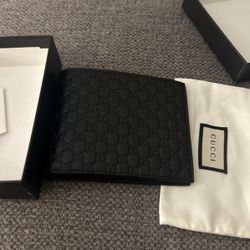 GUCCI Microguccissima Leather Wallet,
