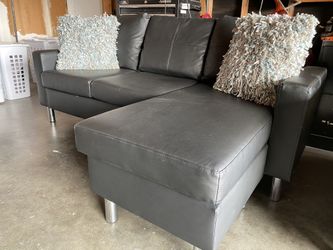 Black leather sectional w movable chaise