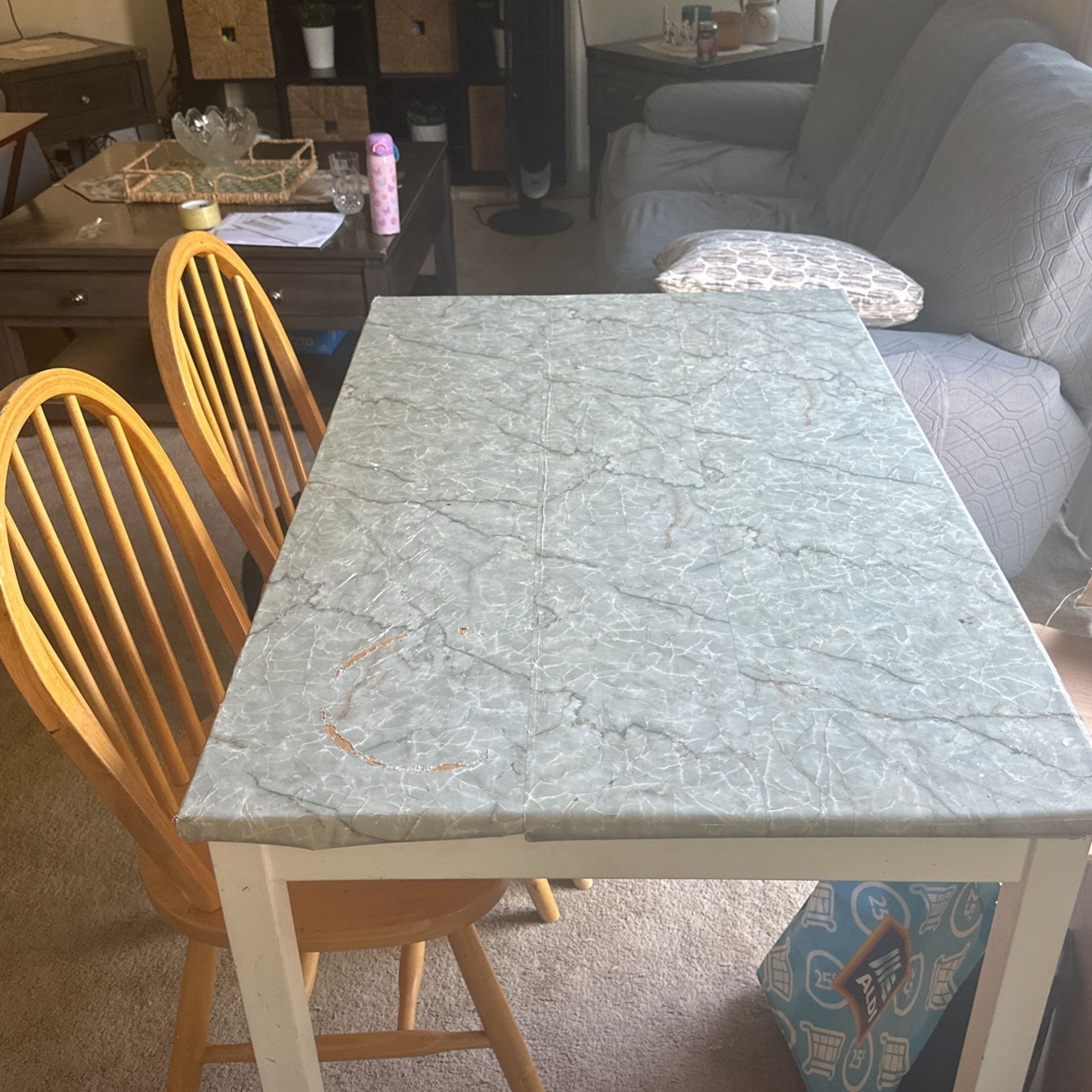 Dining table with two chairs for free