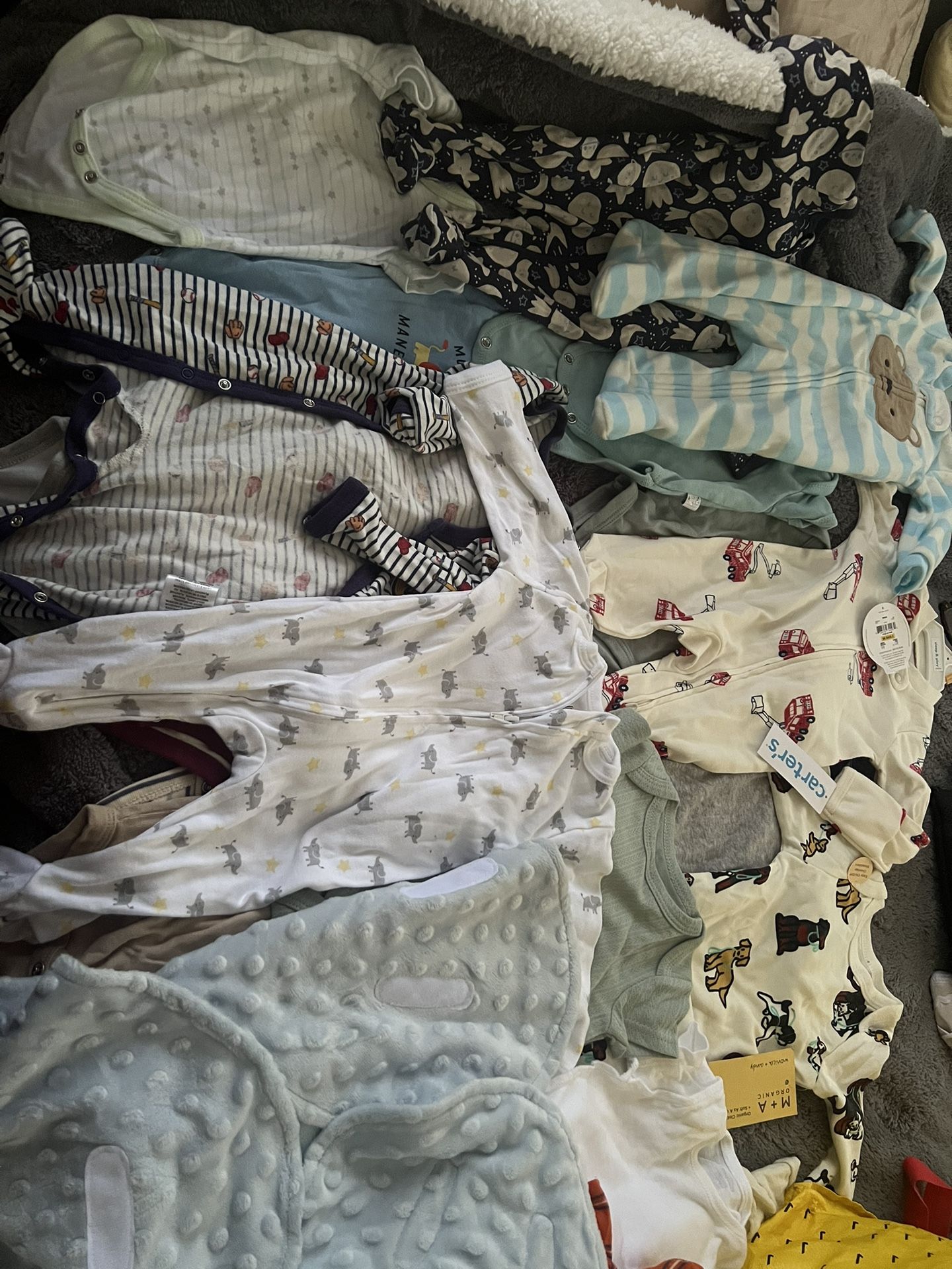 Lightly used And Tagged Newborn And 1-3 Months Baby Boy Clothes.